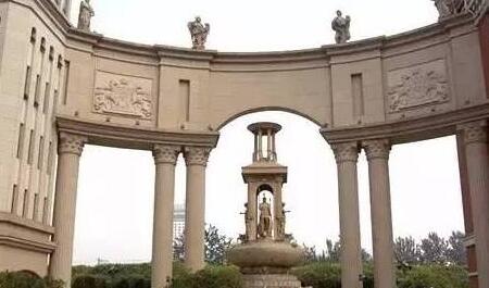 青岛福林山庄黄金麻石材外墙装修效果图案例