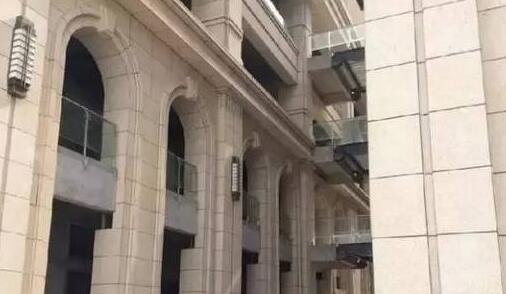 青岛福林山庄黄金麻石材外墙装修效果图案例