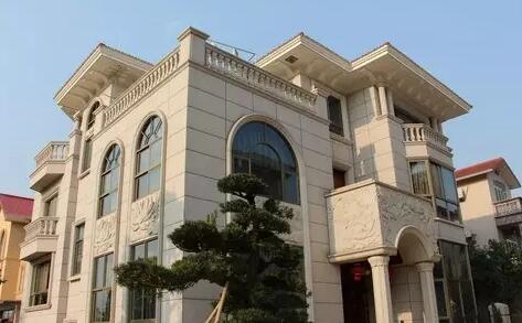 青岛崂山区环海嘉园黄金麻石材外墙装修效果图